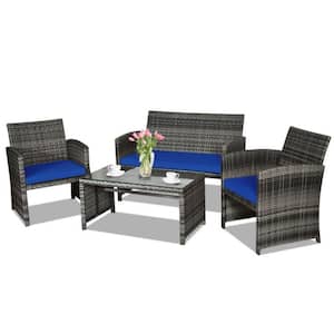 4-Piece Wicker Outdoor Conversation Furniture Set with Navy Cushions and Tempered Glass Table