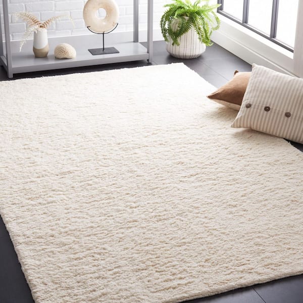Casablanca 8 ft. x 10 ft. Ivory Solid Area Rug