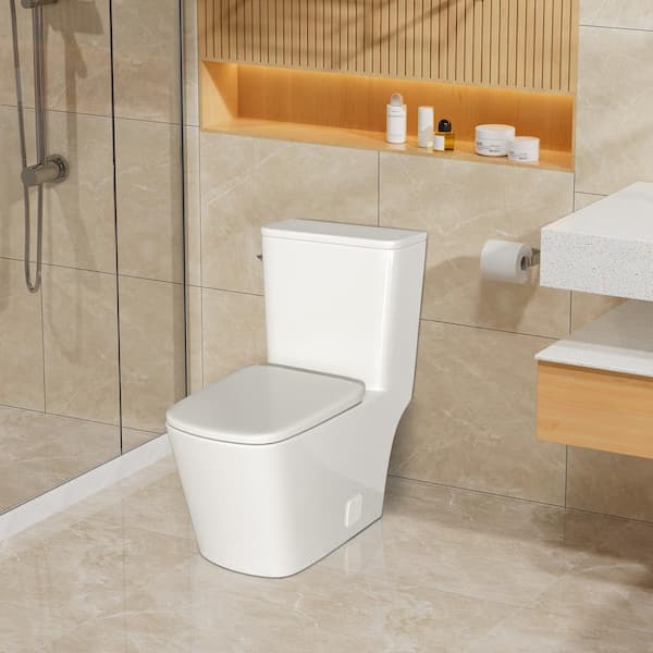 1-Piece Floor mounted 1.28 GPF Single Flush Ceramic Elongated Toilet in White with Soft Closing Seat