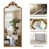 XRAMFY Antique Gold 28 in. W x 69 in. H Arched PU Frame with Ornate Carved Decoration Full Length Mirror Floor Mirror FMPUAC052869GD