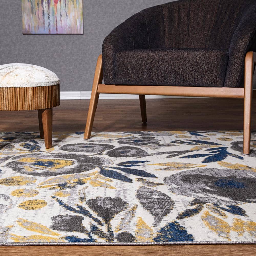 Ivory Floral Bliss 5' x 7' Easy-Care Synthetic Area Rug