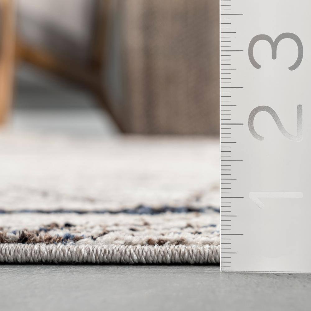 Beige 5'3" x 7'7" Moroccan-Inspired Synthetic Area Rug