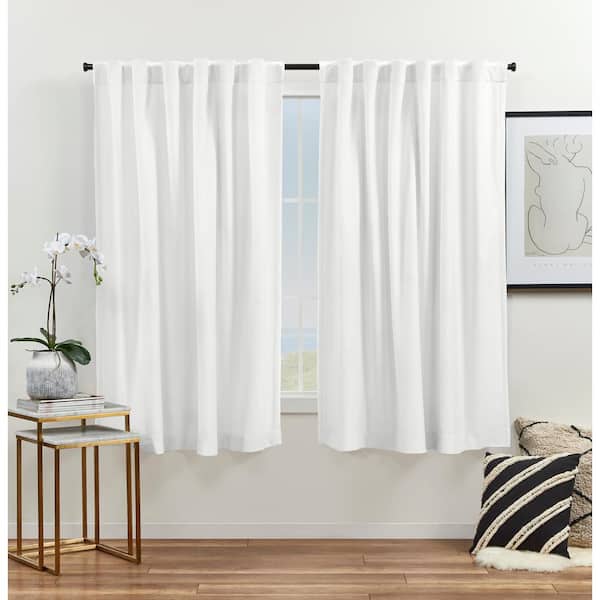EXCLUSIVE HOME Velvet Winter White Solid Light Filtering Hidden Tab / Rod Pocket Curtain, 52 in. W x 63 in. L (Set of 2)