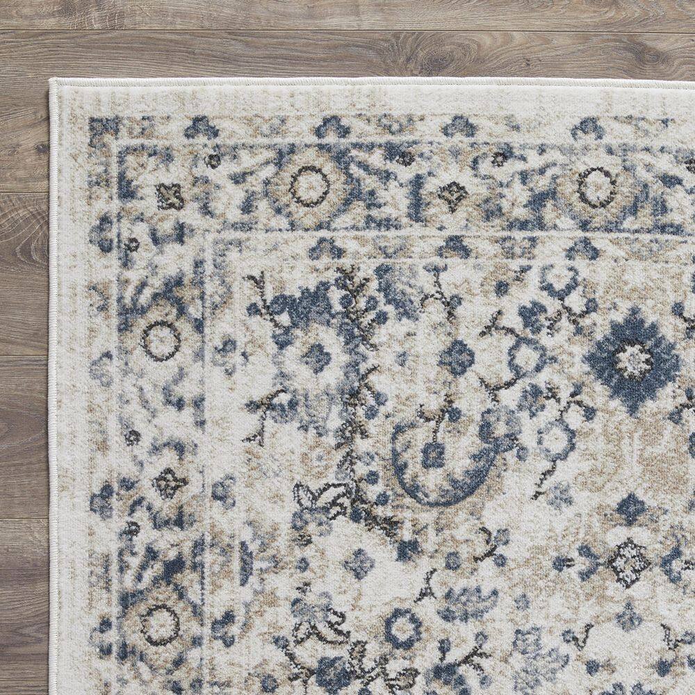 Cream and Blue Floral Border 6' x 9' Synthetic Area Rug