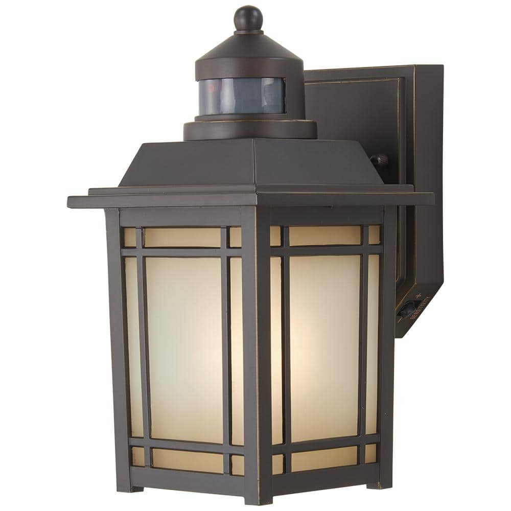 Home Decorators Collection Port Oxford 10.6 in. 1-Light Oil Rubbed Chestnut Motion Sensing Hardwired Outdoor Wall Light Lantern, image size:1000x1000