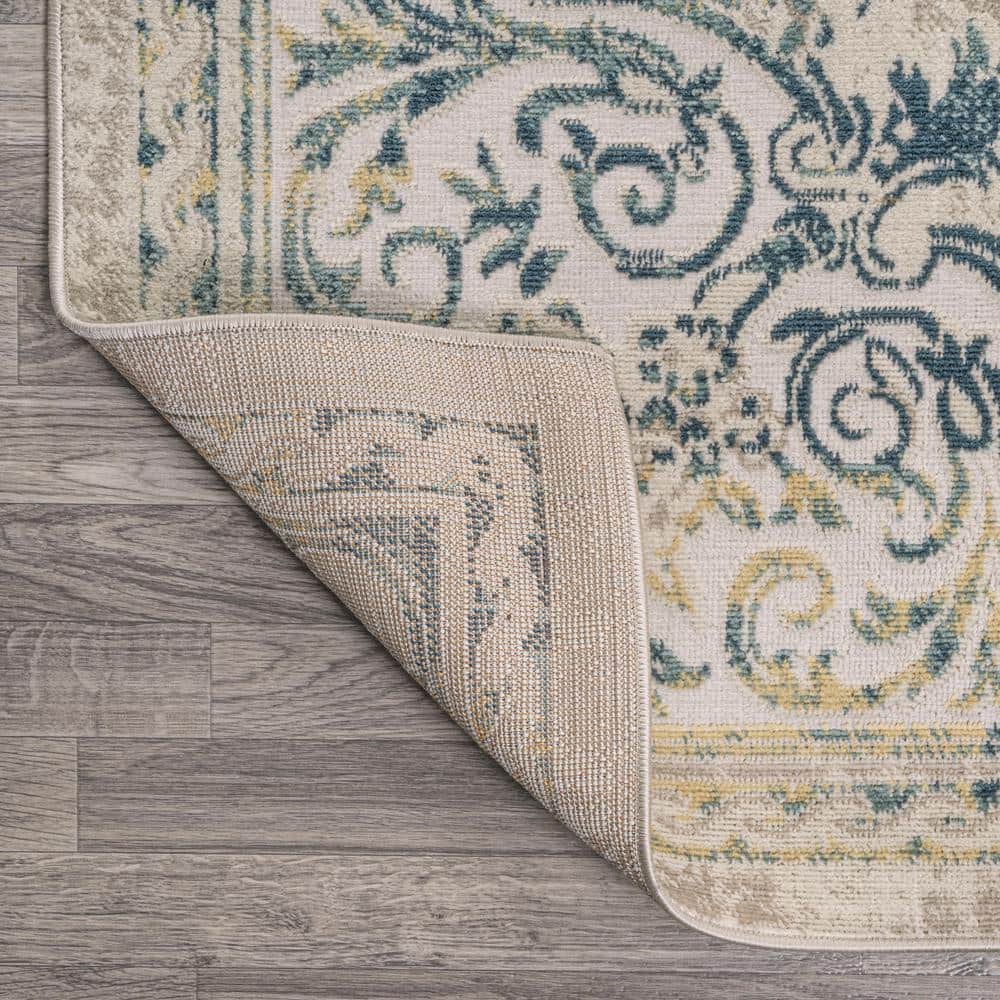 Ivory/Navy 4' x 6' Reversible Synthetic Medallion Rug