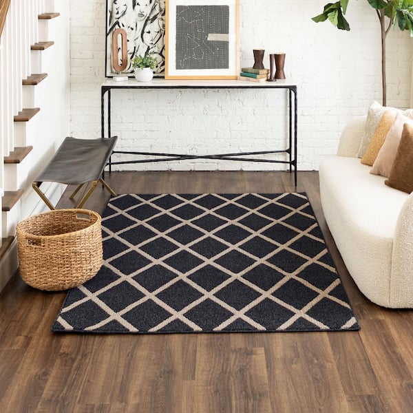 https://images.thdstatic.com/productImages/817007c1-0c3c-45cd-be5b-a2e821467301/svn/diamond-black-mohawk-home-area-rugs-898465-e1_600.jpg