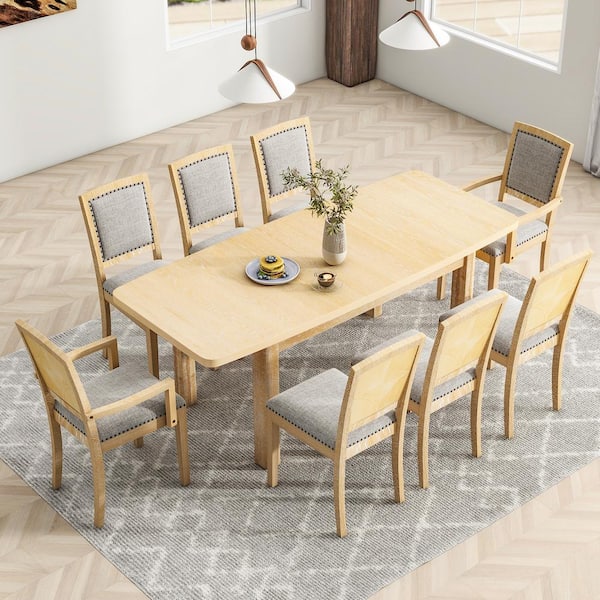 Zeus & Ruta 9-Piece Natural Rubber Wood Outdoor Dining Set with 2-Padded Armchairs and Gray Cushions
