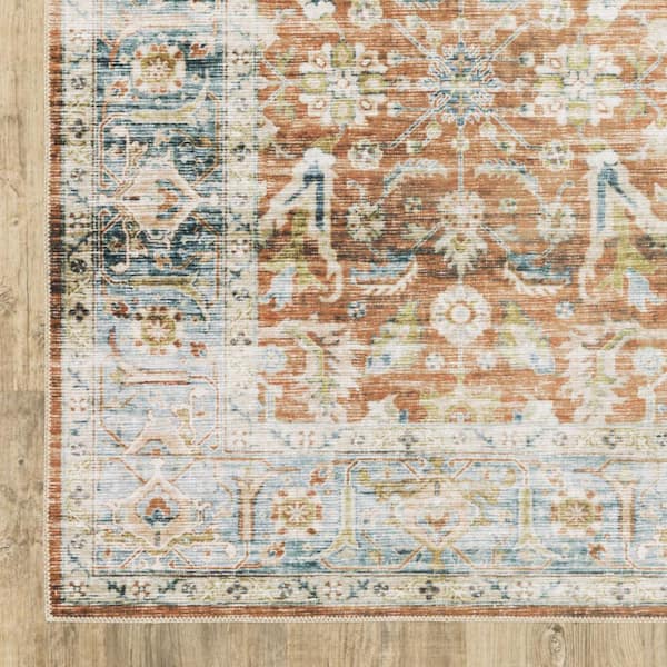 HomeRoots 4' X 6' Rust Blue Ivory And Gold Oriental Printed Stain Resistant Non Skid Area Rug