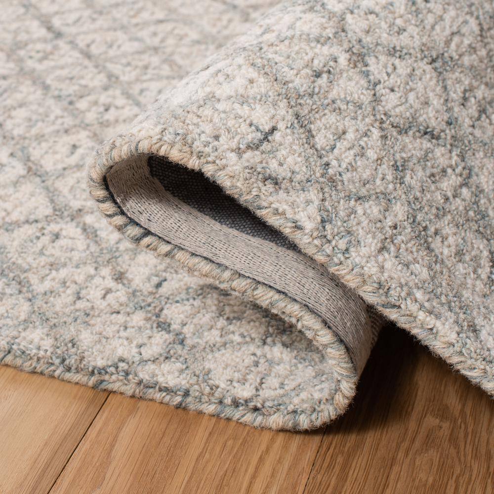 Ivory and Grey 8' x 10' Handmade Wool Abstract Rug
