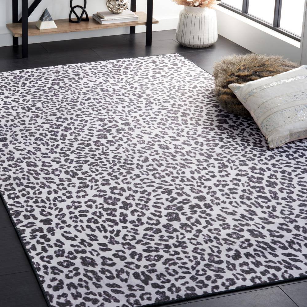 Black and Ivory Faux Fur Animal Print Washable Rug