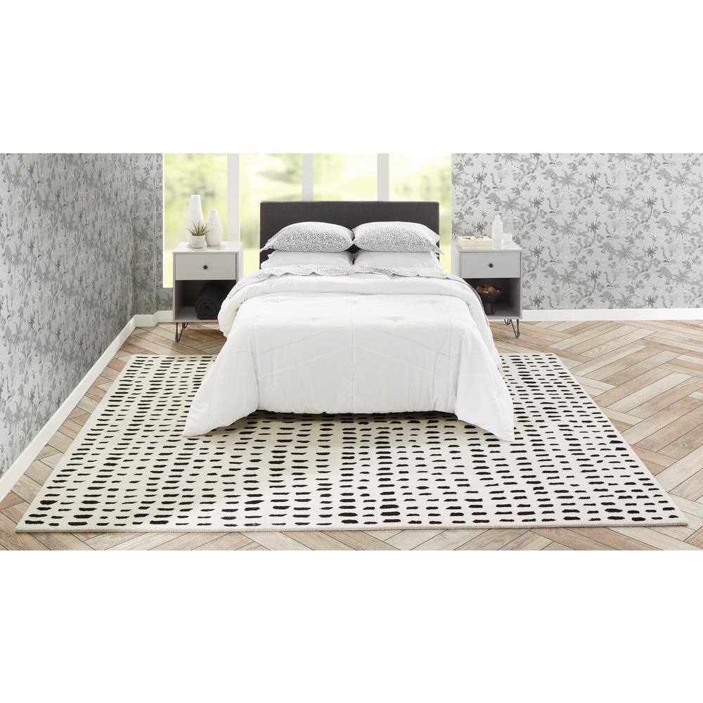 Ivory and Black Wool Geometric 8' x 10' Area Rug