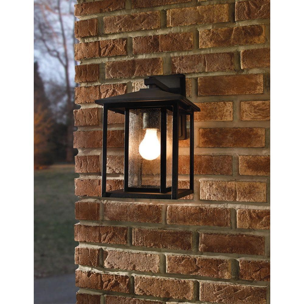 Transitional Hunnington Black Pewter 1-Light Outdoor Sconce with Seeded Glass