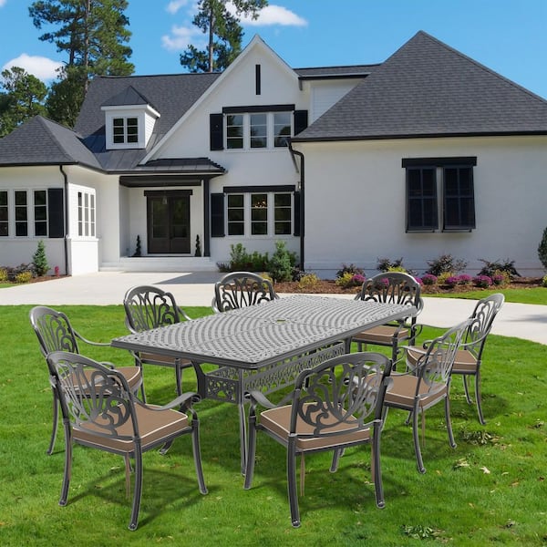 Black 9-Piece Cast Aluminum Outdoor Dining Set with All-Weather Cushions and Stackable Design