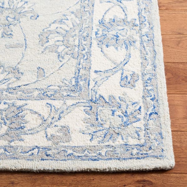SAFAVIEH Micro-Loop Light Blue/Ivory 8 ft. x 10 ft. Border
