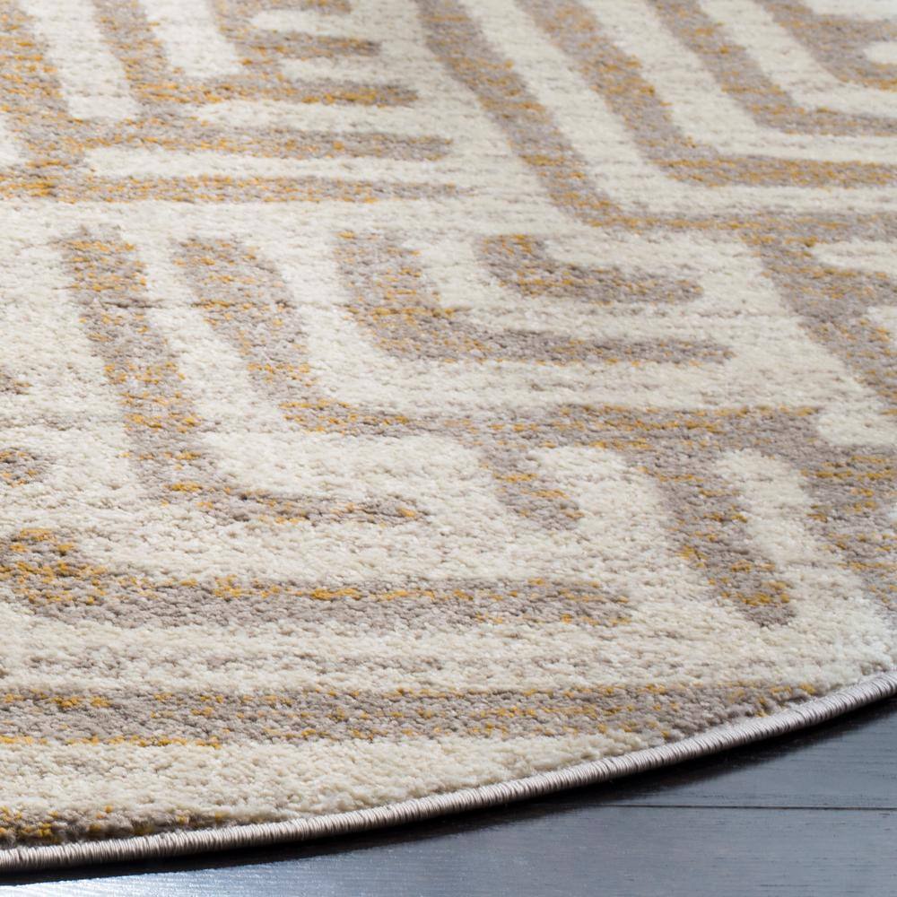 Ivory and Mauve Round Synthetic Abstract Area Rug