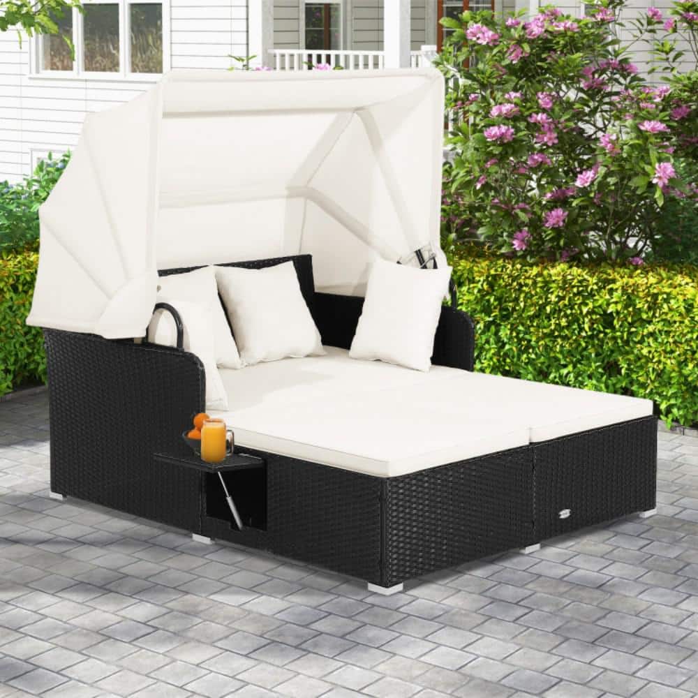 Black Wicker Outdoor Daybed with Off-White Cushions and Canopy
