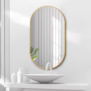 Baily 36 in. W x 18 in. H Small Oval Framed Wall Mounted Bathroom Vanity Mirror in Gold