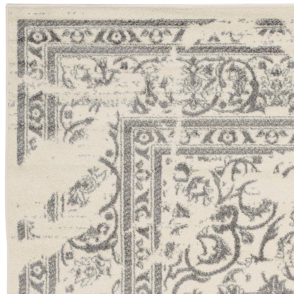 Ivory and Silver Synthetic 8' x 10' Easy-Care Rectangular Rug