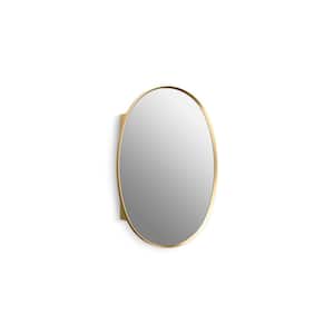 Verdera 24 in. W x 34 in. H Oval Framed Moderne Brushed Gold Recessed/Surface Mount Medicine Cabinet with Mirror