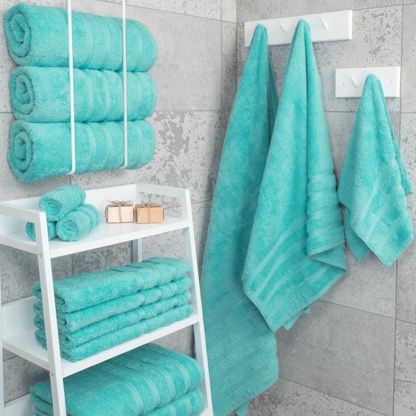 https://images.thdstatic.com/productImages/82f4f976-d79d-4b65-a3e8-3aec424bb709/svn/turquoise-blue-bath-towels-ed-4bath-turq2-e130-1f_600.jpg