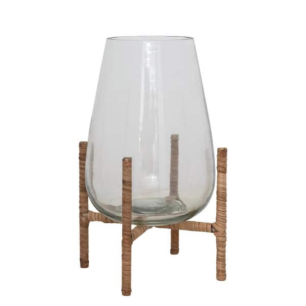 Storied Home Clear Glass Vase with Rattan Wrapped Metal Stand