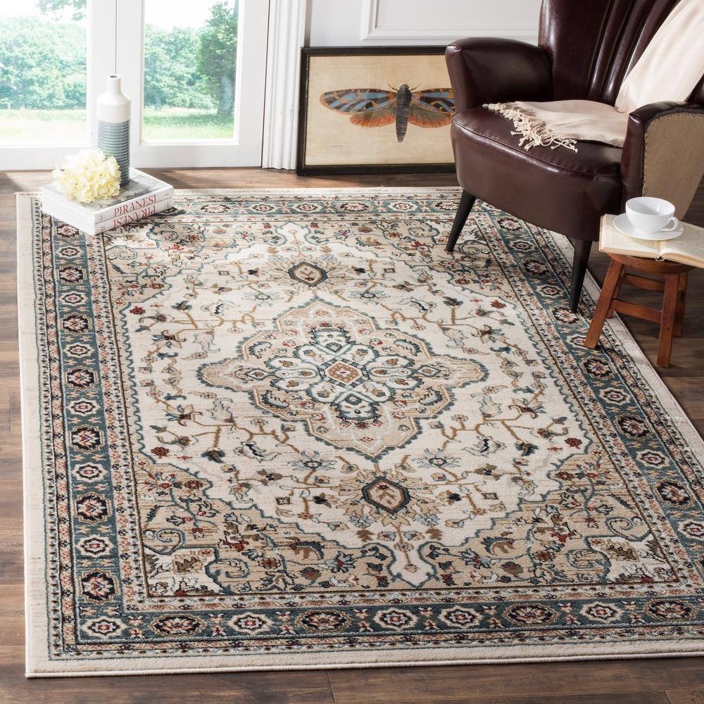 Gray and Cream 8' x 10' Synthetic Traditional Area Rug