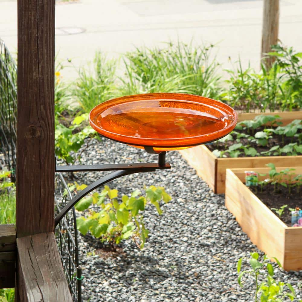 Mandarin Orange Crackle Glass Birdbath with Wrought Iron Wall Bracket