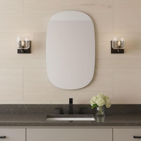 SCOTT LIVING Lochdale Small 5.375 in. 1-Light Midnight Black Sconce Vanity Light with Clear Ribbed Glass Shade