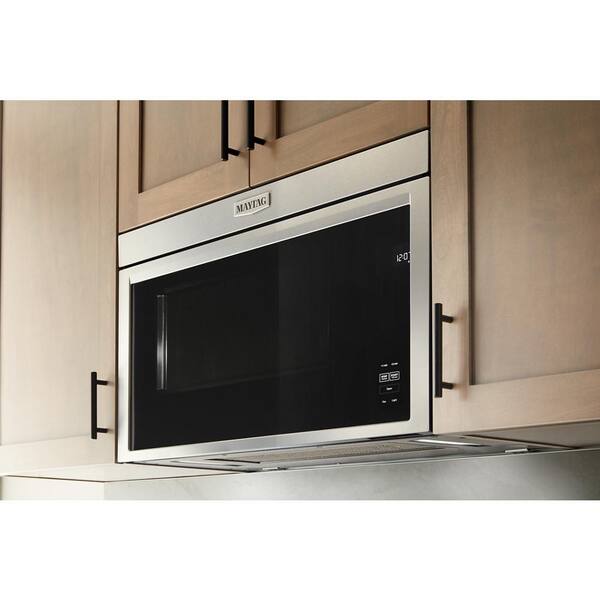 https://images.thdstatic.com/productImages/83239b90-95c4-4d92-bf93-2b5fc49af5b9/svn/white-maytag-over-the-range-microwaves-mmmf6030pw-31_600.jpg