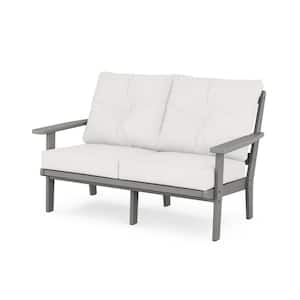Oxford Deep Seating Plastic Outdoor Loveseat with in Slate Grey/Natural Linen Cushions