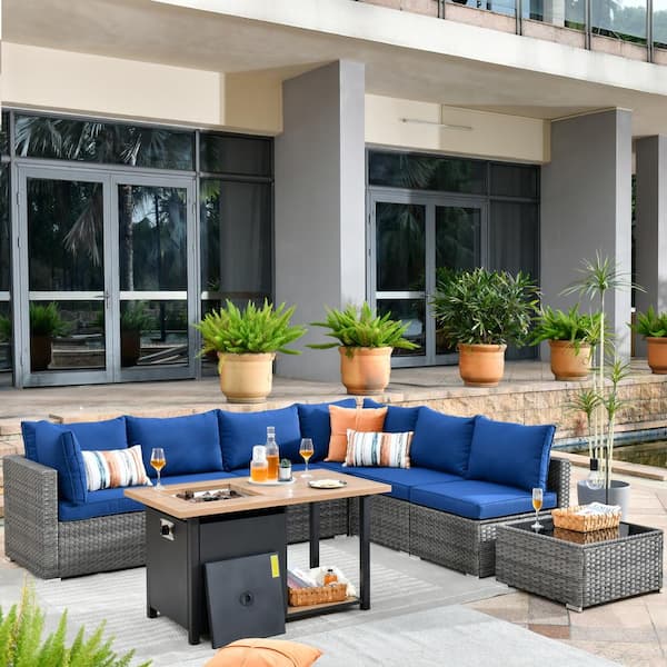 Toject Sanibel Gray 8-Piece Wicker Outdoor Patio Conversation Sofa Seating Set with a Storage Fire Pit and Navy Blue Cushions