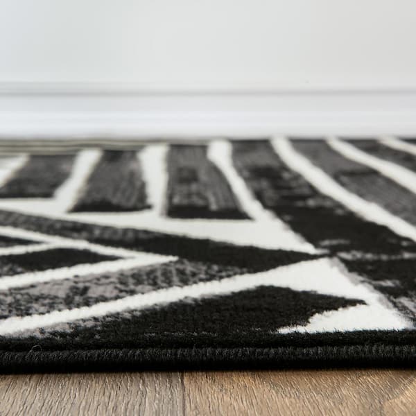 Milan 5 ft. X 7 ft. Black Contemporary Stripe Design Area Rug