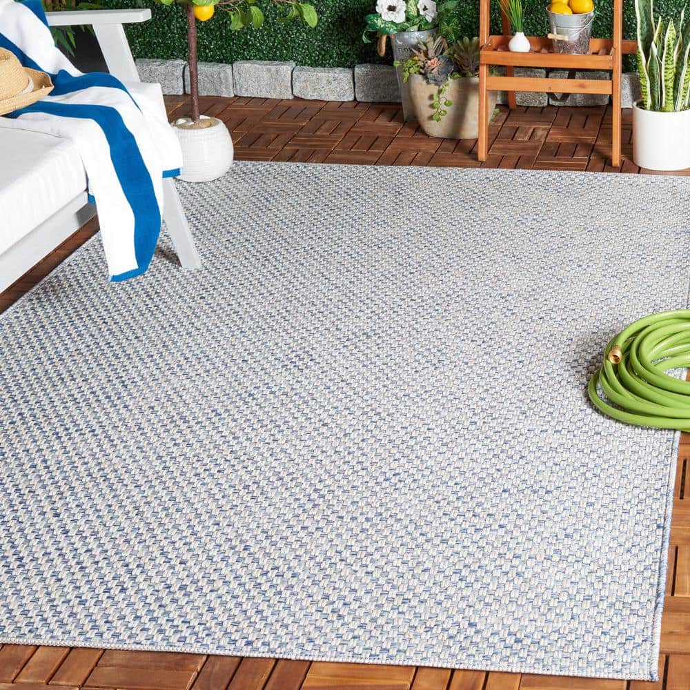 Blue and Ivory Synthetic Flat Woven Rectangular Rug, 5' x 7'