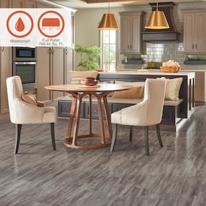 Outlast+ Seabrook Walnut 12 mm T x 5.2 in. W Waterproof Laminate Wood Flooring (769.4 sqft/pallet)