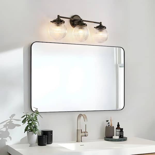 Loudoun 24.4 in. 3-Light Modern Black Linear Ribbed Glass Globe Bubble Bathroom Vanity Light over Mirror