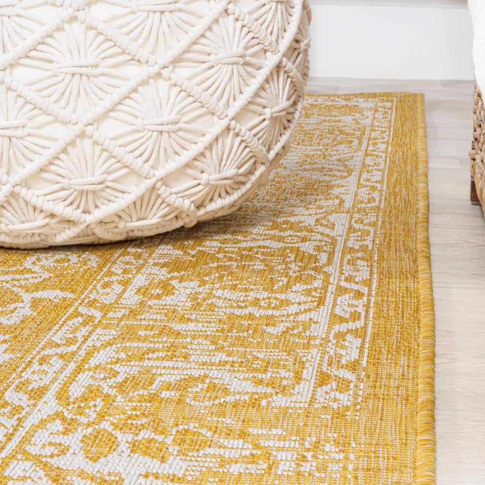9' x 12' Yellow and Cream Floral Synthetic Rectangular Rug