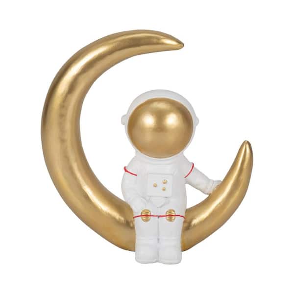 Liv & Skye White and Gold  7 in. x 7 in. Resin Space Man on Crescent Moon Figurine