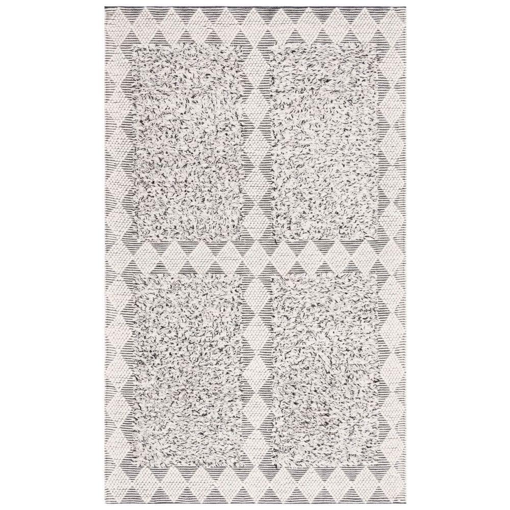 Natura 8 ft. x 10 ft. Black/Ivory Diamond Flokati Area Rug price history on PriceWatchPro