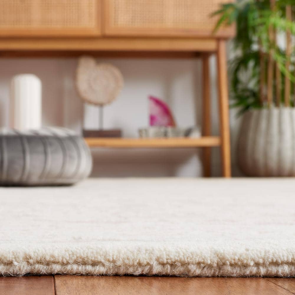 Ivory Wool Handmade Tufted 5' x 8' Area Rug