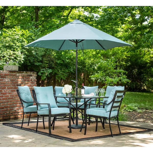 Hanover Lavallette Black Steel 7-Piece Outdoor Dining Set with Umbrella, Base and Ocean Blue Cushions