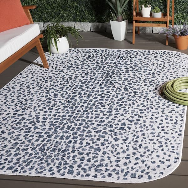 Courtyard 5 ft. x 8 ft. Ivory/Navy Animal Print Indoor/Outdoor Area Rug