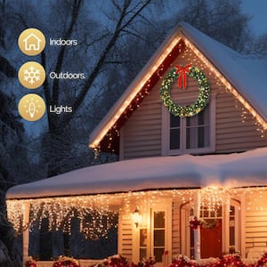 48 in. Pre-lit LED Artificial Christmas Garland with Red Bow