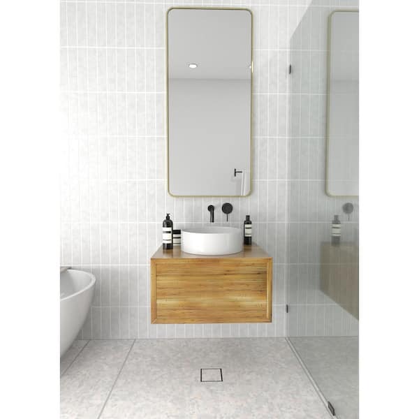 22 in. W x 48 in. H Stainless Steel Framed Radius Corner Bathroom Vanity Mirror in Satin Brass
