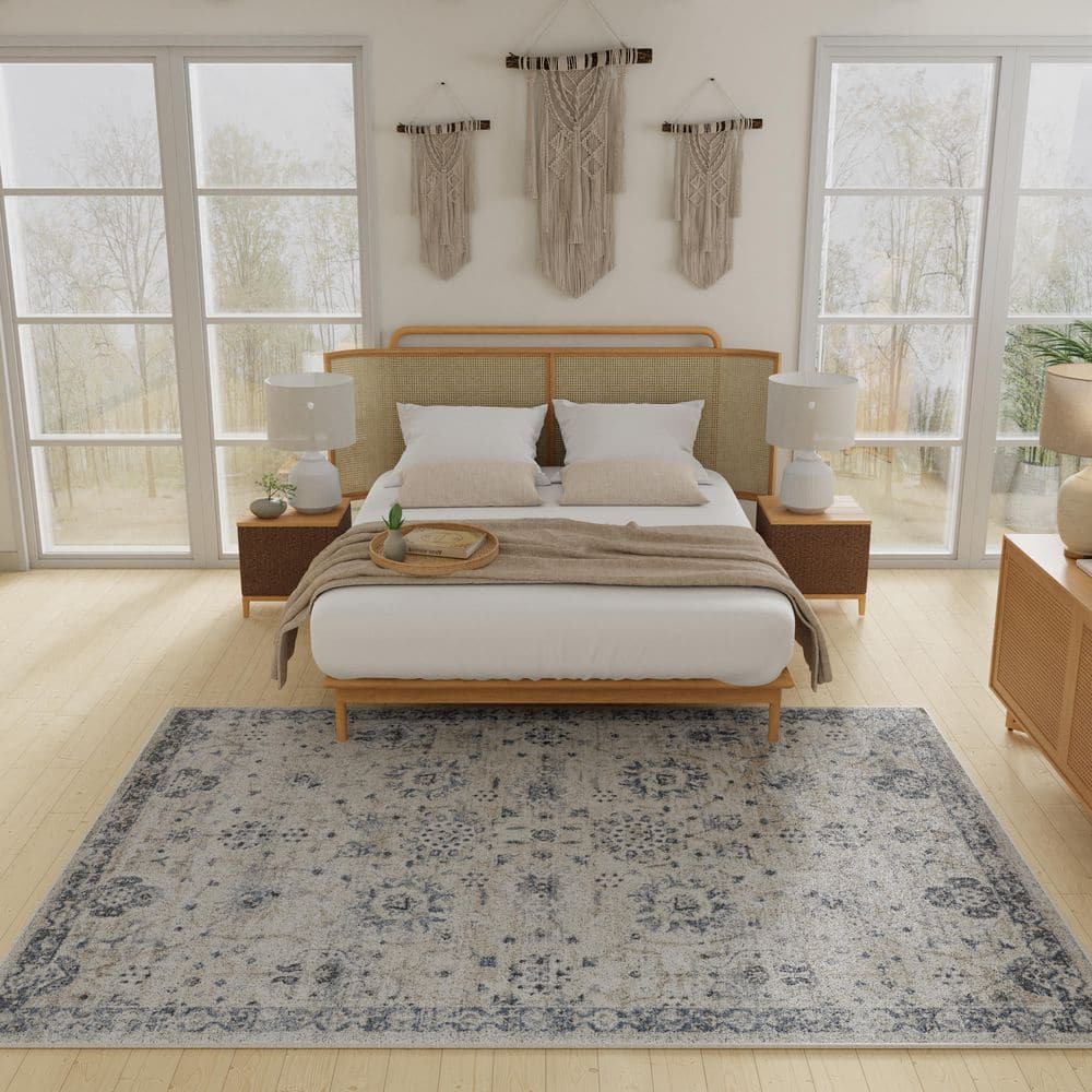 Kehleigh Aylesh 9' x 12' Blue and Cream Synthetic Area Rug
