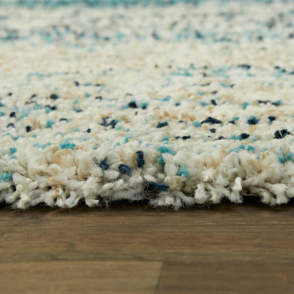 Teal and Beige Abstract Shag 5' x 7' Area Rug