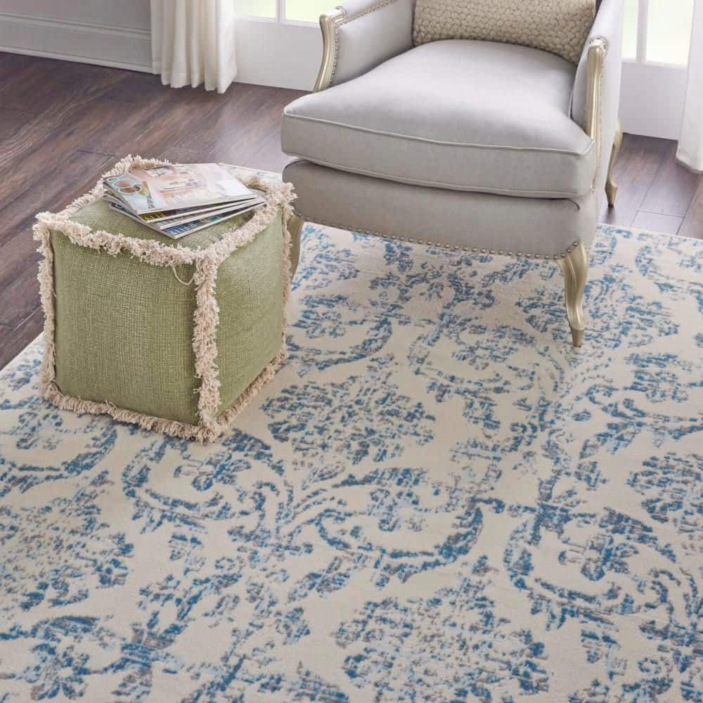 Elegant Ivory and Blue Damask 7' x 10' Synthetic Area Rug