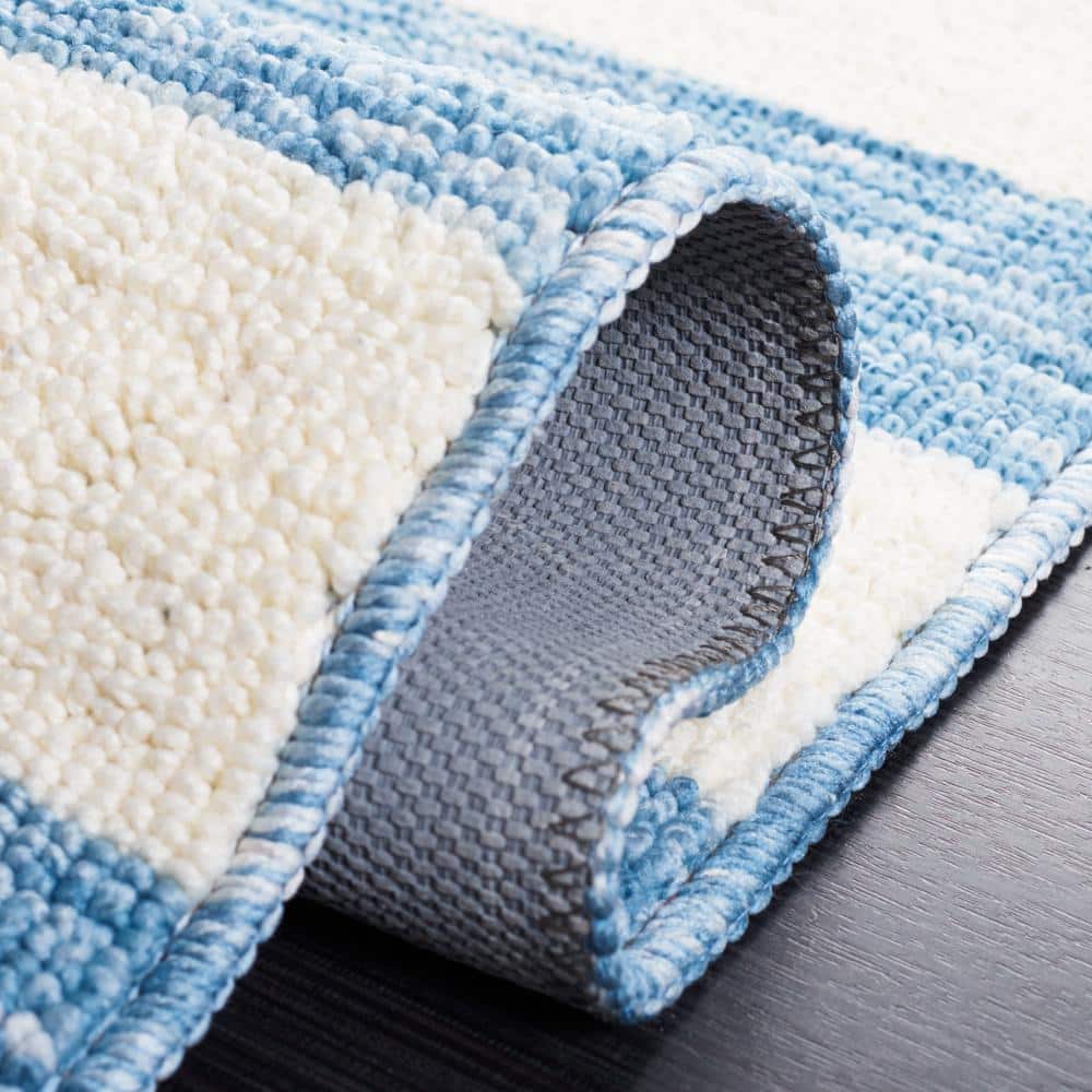 Light Blue and Ivory Striped Synthetic 4' x 6' Area Rug