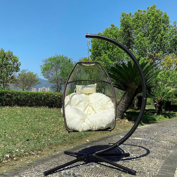 OLUMAT Wicker Patio Swing with Cushion and Pillow in Beige