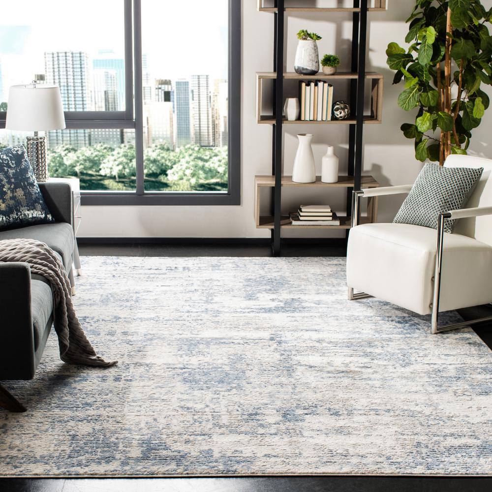 Reversible Abstract Blue and Ivory 11' Square Synthetic Area Rug